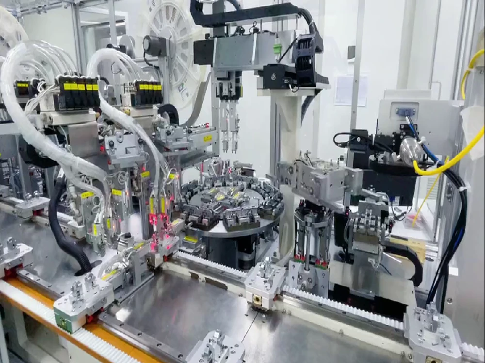 Electric rotary actuator installed in an automation station with fixture and clean cable routing